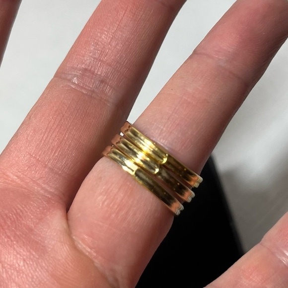 Costume jewelry stacking ring. Set of three. Adjustable Gold tone. Size 5-9. - Picture 2 of 4